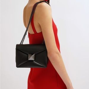 Valentino Garavani
One Stud Leather Shoulder Bag small retail for $3650 plus tax